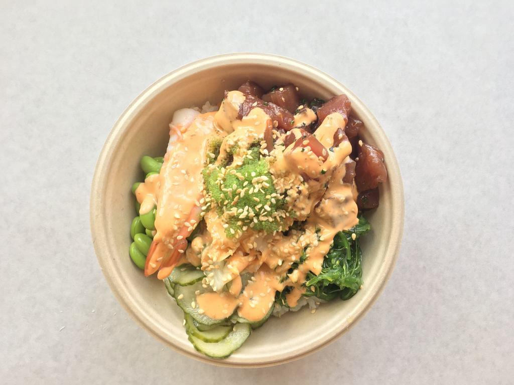 Ahi Poke Bowl* · Sushi rice, ocean salad, edamame, shrimp, pickled cucumber, sriracha aioli, sesame seeds.