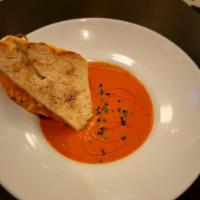 Homemade Tomato Soup · with Grilled cheese Crostini