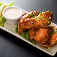 Jumbo Chicken Wings · tossed with your choice of sauce