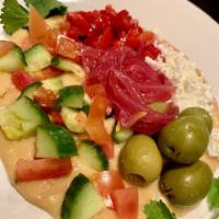 Greek Salad Hummus · cucumber, tomato, feta, olives, house-made chickpea & red pepper hummus, toasted pita