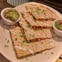 Chipotle Chicken Quesdilla · Chipotle Marinated Chicken, Cheddar Cheese, Queso Fresco, Sour Cream, Guacamole and Pico de ...