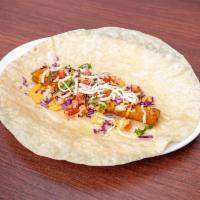 Fish burrito · With: breaded fried fish, diced cabbage, chipotle lime mayo, pico de gallo and cheese.