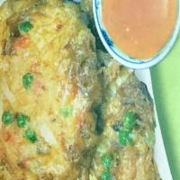 47. Vegetable Egg Foo Young · With white rice.