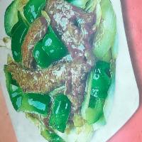 97. Pepper Steak with Onion · With white rice.