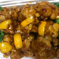 S16. Orange Chicken · With white rice. Hot and spicy.