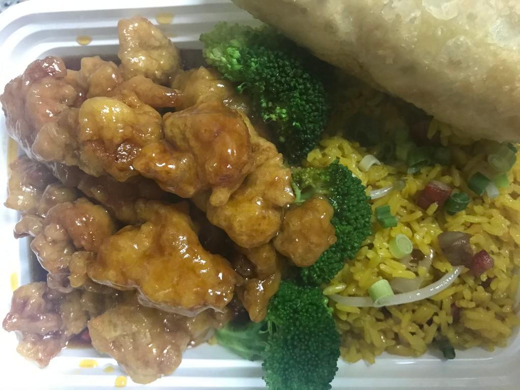 C24. General Tso's Chicken Combo Plate · Served with roast pork fried rice and egg roll. Hot and spicy.