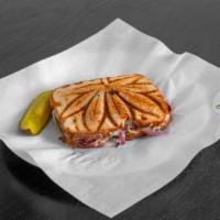 Mario Lanza Panini · Mozzarella, salami, sun-dried tomato, onion, and balsamic.