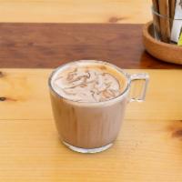 Mocha Froth · Coffee, chocolate sauce and steamed milk