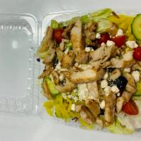 Greek Salad · Iceberg, tomato, cucumber, onion, black olives, feta cheese and pepperoncini.