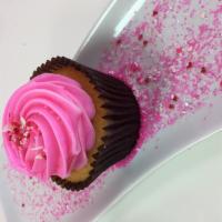 Pink Vanilla Cupcake · Vanilla cake with pink buttercream.