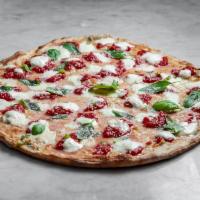 Margherita Pizza · Hand stretched thin crust dough, crushed California tomatoes, aged and fresh Grande Mozzarel...