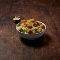 Caesar Salad · Romaine lettuce, croutons and grated cheese in a traditional Caesar dressing.
