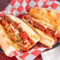 #4. The Teflon Don - John Gotti Sandwich · House-made crispy chicken breast, breaded and fried then topped with San Marzano tomato sauc...