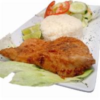 Pescado Frito · Fried Fish Filet Served with Rice, Golden Fried Potato and Peruvian Creole Salad.