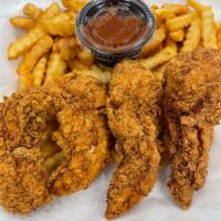 Tender Basket · Four golden fried chicken tenders. Get them tossed in any of our sauces or plain. Comes with...