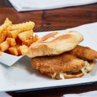 Honey Truffle Chicken Sandwich · Fried Chicken Tenders dipped in Truffle Honey, Iceberg and Pickle on a toasted Bun