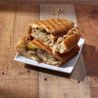 Cuban Sandwich · roast pork, swiss cheese, honey ham, pickles & garlic butter served on a toast cuban bread