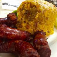 Mofongo & Dominican Sausage · Made with choice of plantains, cassava or yucca.