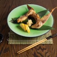 Hamachi Kama · Grilled yellowtail neck with spicy ponzu sauce. 