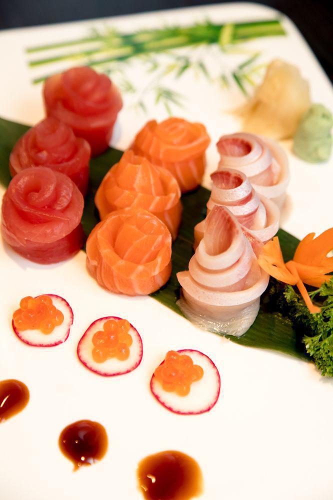 Triple Color Sashimi Entree · 6 pieces tuna, 6 pieces salmon,6 pieces yellowtail with rice only.