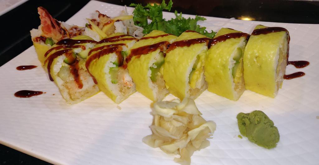 Lobster Roll · Lobster tempura, mango, asparagus, avocado, wrapped in cucumber, topped with eel sauce and fruity sauce.