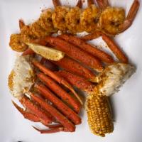 Double Snow Crab and Shrimp · 2 Alaskan Snow Crab Clusters, 8 Black Tiger Shrimp, 2 Ears of Corn, 3 Red Skin Potatoes, 4 o...