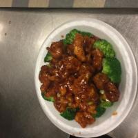C1. General Tso's Chicken · Crispy golden tender chicken morsels served in a mildly seasoned sauce with broccoli. Hot an...