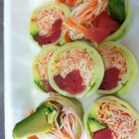 Sushi Com Roll · Tuna, salmon, crab salad, avocado, and wrapped in cucumber.