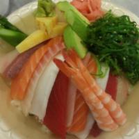 Chirashi bowl · 6 kinds of fish over white rice, avocado, seaweed salad, asparagus, tamago, and cucumber ser...
