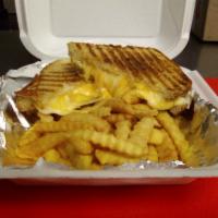 Triple X Melt · Cheddar Jack, Mozzarella, and American cheese grilled to golden gooeyness,  served with hous...