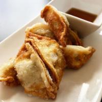 Vegan Pot Stickers · Tofu, Leeks, green onion, onion, cabbage, carrots, and ginger wrapped in a wonton paper. dee...