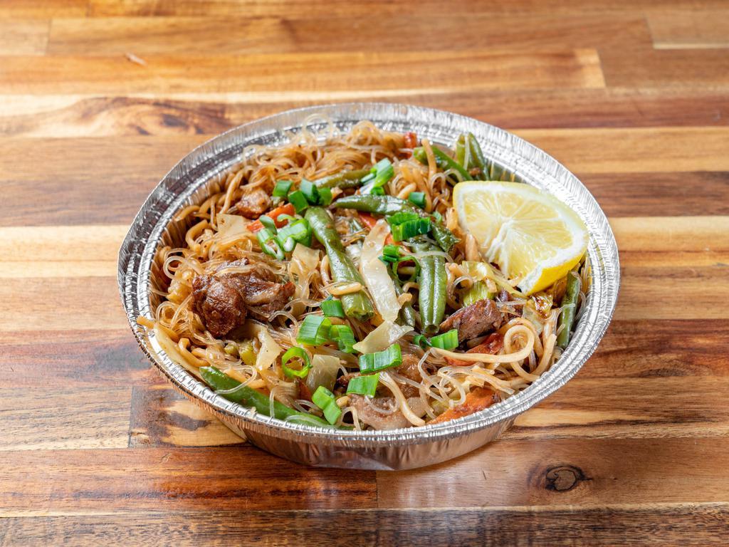 Bihon canton(7inch round tin) · Angel hair noodles sauteed with vegetables and pork. 