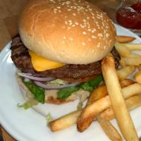 8 Oz. Cheeseburger Deluxe · Lettuce, tomato, and onions with french fries or onion rings.