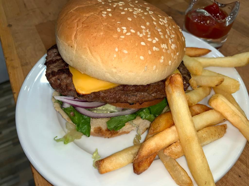 8 Oz. Cheeseburger Deluxe · Lettuce, tomato, and onions with french fries or onion rings.