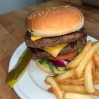 8 Oz. Double Cheeseburger Combo · Lettuce, tomato, and onions with french fries or onion rings and can of soda.