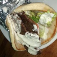 Gyro Sandwich · Lettuce, tomato, onions and white sauce.