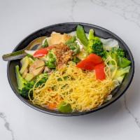 22. Veggie and Tofu Egg Noodle Soup · Mi chay. Vegetables and tofu egg noodle soup with choice of chicken broth or veggie broth.