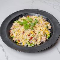 11. House Fried Rice · Com chien viet's. Stir fried jasmine rice with a combination of shrimp, Vietnamese ham, egg,...