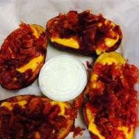 Potato Skins · Stuffed with cheese and real bacon bits. 