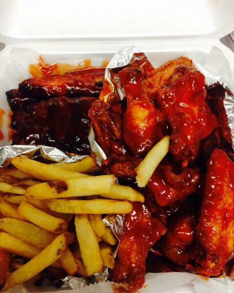9. Buffalo Wings and Ribs · Served with fries, 12 wings and 3 ribs.