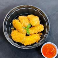 6 Salt and Pepper Chicken Wings 鸡翅 · Cooked wing of a chicken coated in sauce or seasoning.