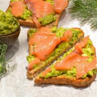 New Salmon Avocado Toast  · Avocado spread, Salmon, Lemon, Olive Oil and crumbled Feta on a thin slice of  free form ova...