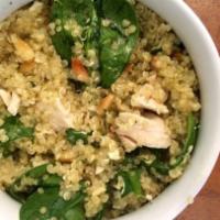 Spinach Pesto Chicken Quinoa Bowl · Chopped spinach, cherry tomatoes, small pieces of grilled chicken and pesto on a bed of orga...