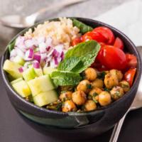 Mediterranean Chickpea Bowl with peanut dressing · Mediterranean chickpea bowls with creamy peanut sauce! Made with spiced chickpeas, spinach, ...