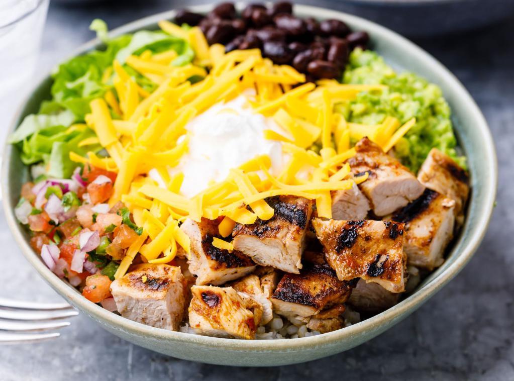 Chicken Burrito Bowl · Served with diced chicken, cilantro rice, black bean, corn, romaine lettuce, pico de gallo, guacamole and sour cream or cheese.