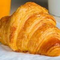 Plain Croissant · A rich, buttery, crescent-shaped roll of leavened dough or puff paste.