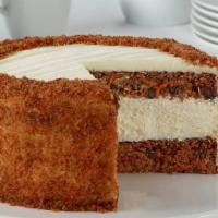 Junior's Skyscraper Tall Cheesecakes  · Carrot Cake-Original New York cheesecake layered with a traditional carrot cake, made with f...