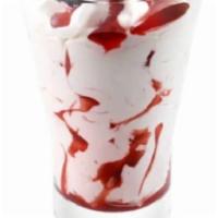 Coppa Spagnola · Vanilla gelato and American cherry sauce swirled together and topped with Amarena cherries.