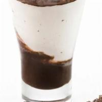 Coppa Stracciatella · Chocolate chip gelato swirled together with chocolate syrup, topped with cocoa powder and ha...