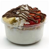 Nutelloco Coconut Bowl · Coconut bowl blend with raw coconut and coconut milk topped with granola, banana, strawberry...